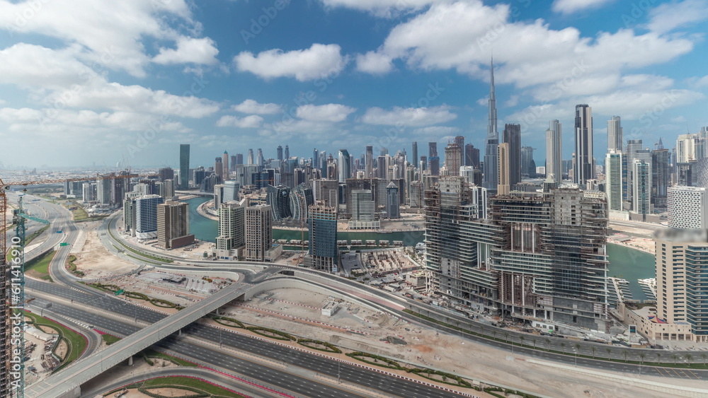 Panorama showing skyline of Dubai with business bay and downtown district timelapse.