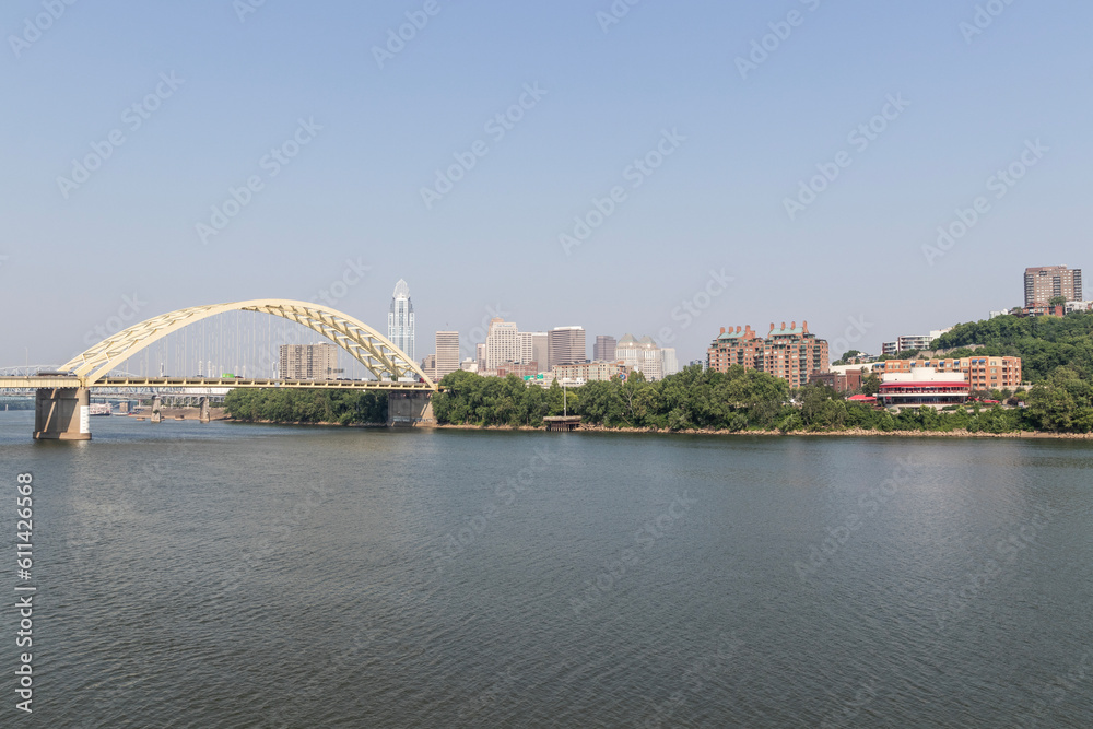 Cincinnati Downtown Skyline including the Great American tower and Daniel Carter Beard Bridge along the Riverfront.