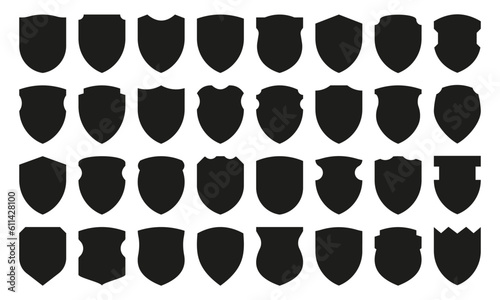 Black shields collection. Medieval protection monochrome silhouettes, blank security badges and heraldic insignia protection seal club badge. Vector set. Safety equipment of different shapes