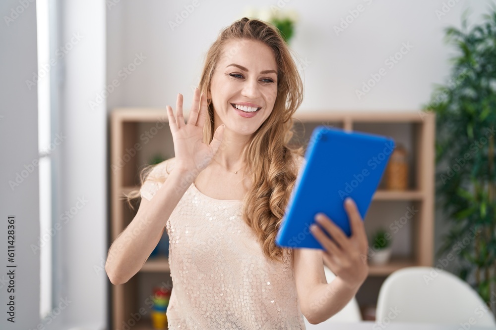 Young blonde woman smiling confident having video call at home Young blonde woman smiling confident having video call at home