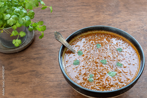 Horsegram Dal (Kulith or Kollu Dal) homemade dish with fresh coriander.
 photo