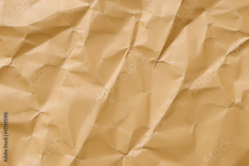 Brown crumpled paper texture. Abstract brown recycled paper background