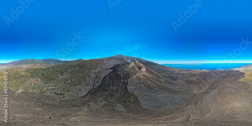 Aerial view above volcanic crater