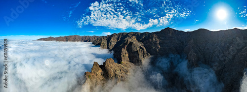 Aerial panoramic above the clouds at the beautiful Caldera de Taburiente National Park in La Palma - Canary Islands