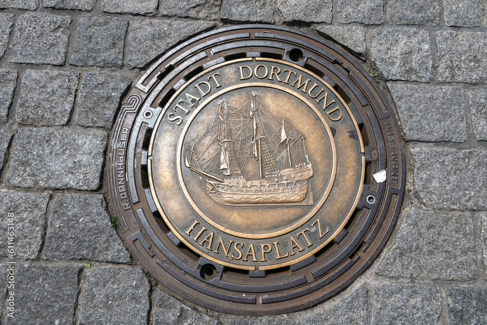 Dortmund, Germany, May 29, 2023, Dortmund city sewer plate with a boat Dortmund, Germany, May 29, 2023, Dortmund city sewer plate with a boat