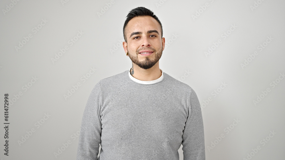 Hispanic man smiling confident over isolated white background Hispanic man smiling confident over isolated white background