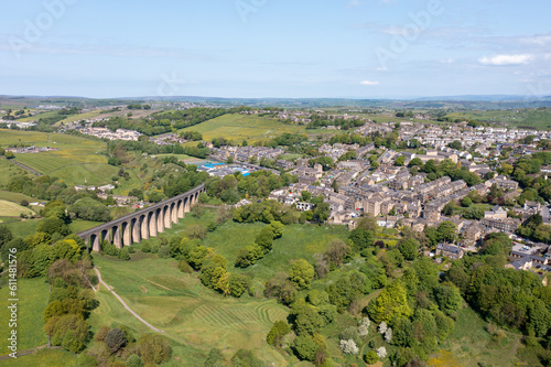 Tableau sur toile Aerial drone photo of the town of Thornton which is a village within the metropolitan borough of the City of Bradford, in West Yorkshire, England showing the village and viaduct in the summer time