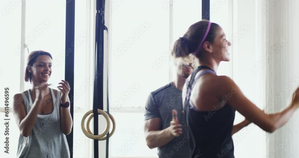 Fitness, high five and support with people in gym for workout goals, motivation and health club. Training, coaching and exercise with friends in class for celebration, challenge and wellness