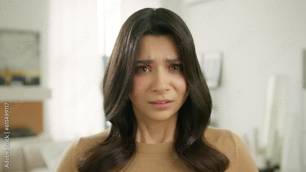 Upset nervous female in trouble having problem, need psychological help posing to camera alone at home background 4K. Sad depressed young woman feeling bad. Girl stressed worried anxious ashamed slow Upset nervous female in trouble having problem, need psychological help posing to camera alone at home background 4K. Sad depressed young woman feeling bad. Girl stressed worried anxious ashamed slow