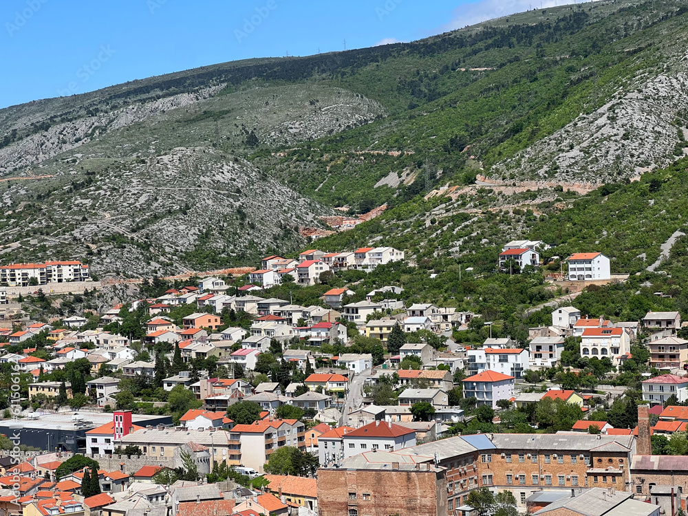 Naklejka premium View of the town of Senj in the Kvarner Bay and residential houses on the slopes of Velebit from Nehaj fortress - Croatia (Pogled na grad Senj u kvarnerskom zaljevu i kuće na obroncima Velebia)
