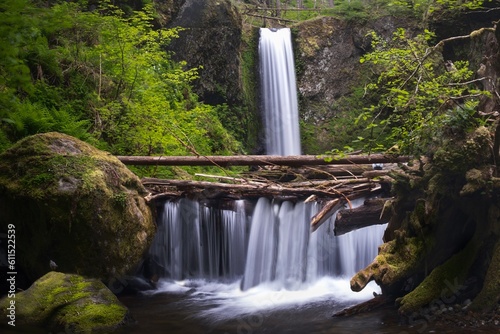 Waterfalls in lush green forest. Rain forest in Columbia River gorge. Oregon. USA