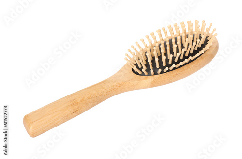 One new wooden hairbrush isolated on white