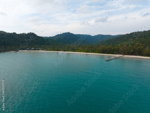 Aerial drone view of beautiful beach with turquoise sea water and palm trees of Gulf of Thailand. Kood island, Thailand.