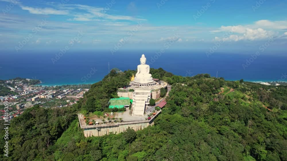White Marble Big Buddha Statue Temple. Close Up Aerial View big buddha on top of mountains at Phuket Thailand White Marble Big Buddha Statue Temple. Close Up Aerial View big buddha on top of mountains at Phuket Thailand