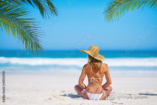 Tropical mockup, beach and back of woman on island on sand for adventure, holiday and vacation in Mauritius. Travel, ocean and female person relax in bikini by sea for tourism, traveling and getaway