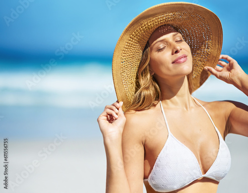 Photography Hat, summer and face of woman on beach, vacation or relax on holiday in sun, sea and ocean with blue sky