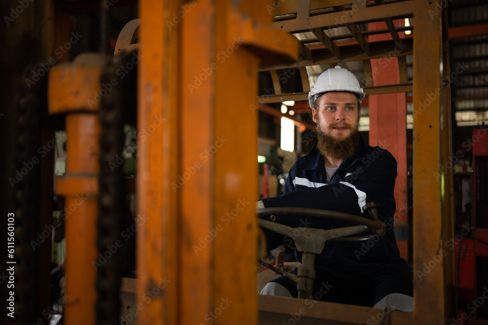 Engineer checks the operation of the forklift truck after the repair is completed. Engineer checks the operation of the forklift truck after the repair is completed.