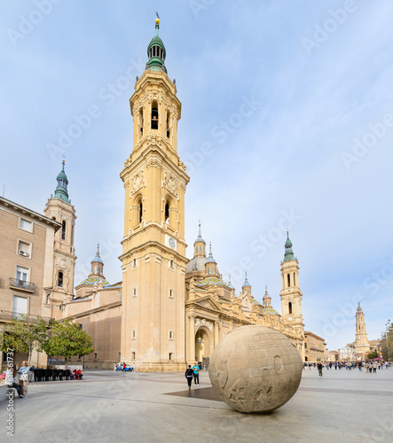 Zaragoza, Spain - May 01, 2023: tourists strolling in the square in front of the basilica of El Pilar in Zaragoza, Spain photo