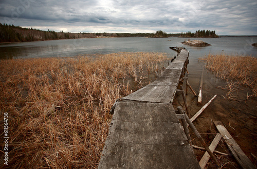 Dilapidated dock on Reed Lake in Northern Manitoba photo
