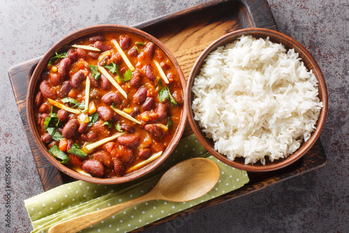 Canvas Print Rajma Masala is a popular North Indian dish made with red kidney beans and rice close-up on a wooden tray on the table