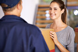 Delivery, shipping and courier with woman at door for logistics, cargo and supply chain. Ecommerce, package and export with man giving customer box at home for distribution, freight and retail