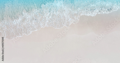 Aerial view with beach in wave of turquoise sea water shot, Top view of beautiful white sand background