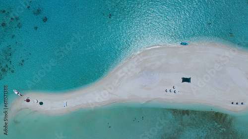 The tropical island in Summer with Sand bank while relaxing on vacation as white sand beach in the lagoon background