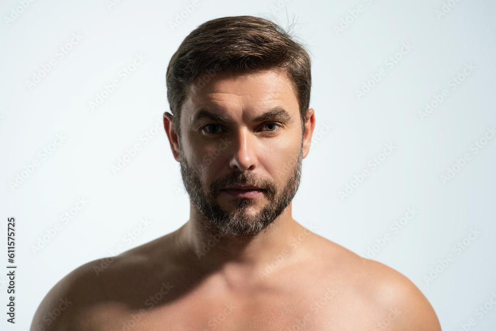 Cosmetics, body care and spa treatment. Portrait of masculinity charming shirtless man isolated over white background. Close-up portrait of attractive guy. Cosmetics, body care and spa treatment. Portrait of masculinity charming shirtless man isolated over white background. Close-up portrait of attractive guy.