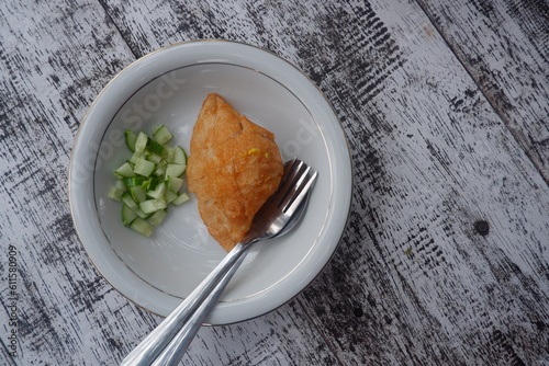 Typical food from Palembang, South Sumatra, Indonesia. Made from fish meat mixed with tapioca flour and flour. Eaten with spicy sauce.