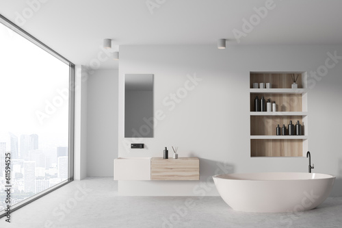 White and wooden bathroom interior with tub  sink  mirror and shelves