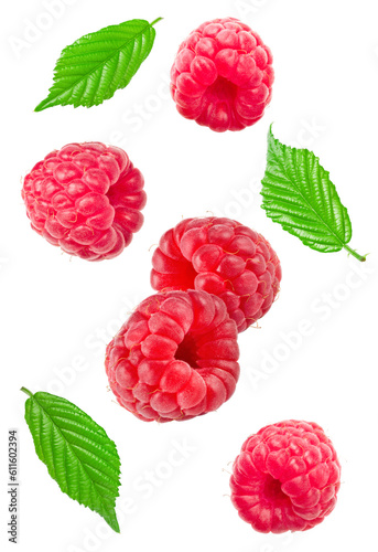 flying ripe raspberry with green leaf isolated on white background. macro. clipping path