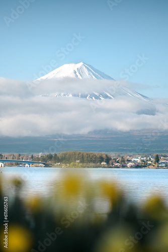 vertical fuji mountain background covered by cloud. symbol of Japan or Nippon in Asia. Spring or summer season with beautiful natural landmark in Lake Kawaguchiko near Tokyo. phone background.