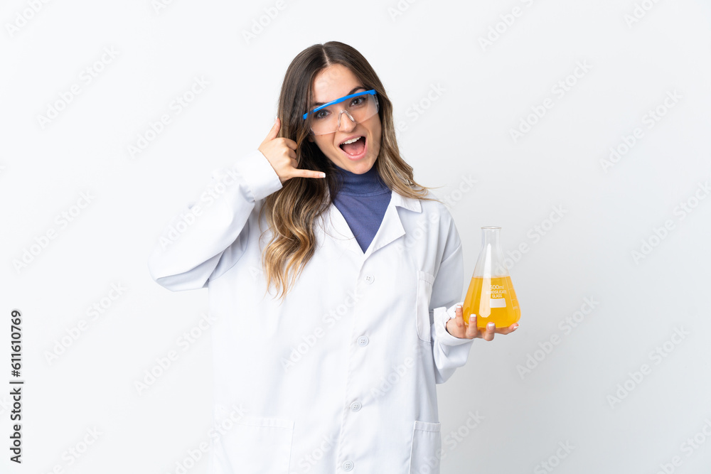 Young Romanian scientific woman isolated on white background making phone gesture. Call me back sign Young Romanian scientific woman isolated on white background making phone gesture. Call me back sign