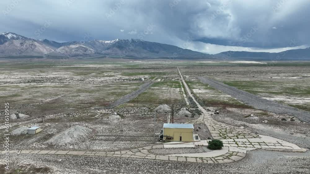 Aerial Tekoi solid fuel rocket motor test site bunkers Utah. Military solid fuel rocket test facility. Abandoned weapon bunkers and missile buildings. Secret Cold War munitions. Nuclear missile. Aerial Tekoi solid fuel rocket motor test site bunkers Utah. Military solid fuel rocket test facility. Abandoned weapon bunkers and missile buildings. Secret Cold War munitions. Nuclear missile.
