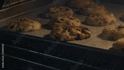 Time lapse of chocolate chip cookies baking in the oven
