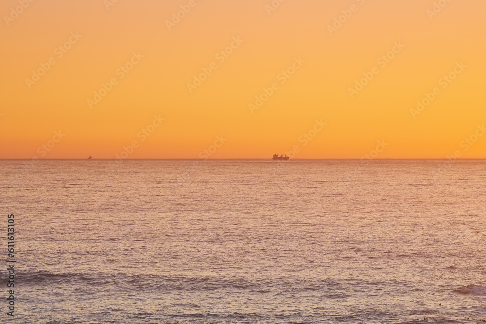 Sky, sunset and sea at night on the horizon with ocean and waves landscape. Sunrise background, calm weather and summer by the beach with coastline and outdoor environment with mockup in nature