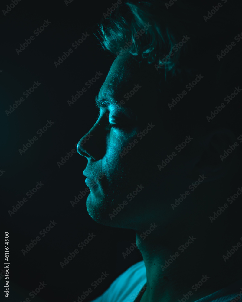 A man filled with envy sits in a dark room A man filled with envy sits in a dark room