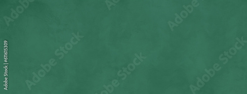 Empty dark green concrete wall background © daboost