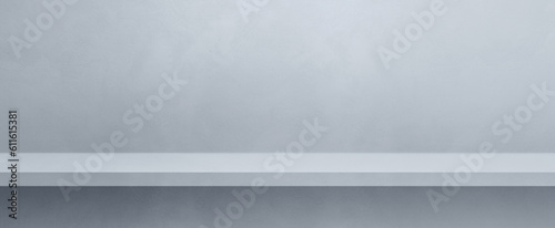 Fototapeta Naklejka Na Ścianę i Meble -  Empty shelf on a light grey concrete wall. Background template. Horizontal banner mockup