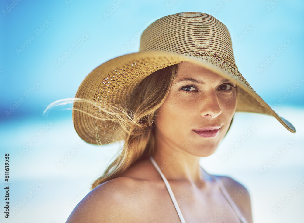 Travel, vacation and portrait of woman at beach for summer, tropical and relax mockup. Wellness, nature and holiday with face of female tourist and hat at seaside for sunbathing and paradise