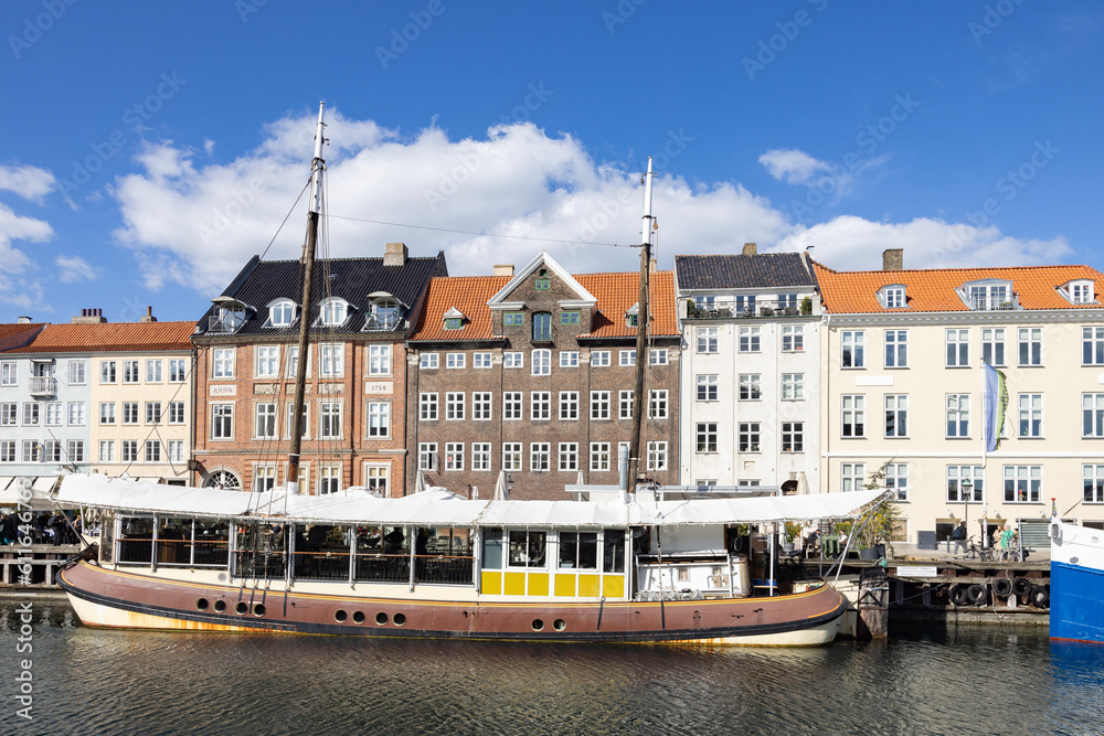 Wanderlust in the streets of Copenhagen, Here from Nyhavn (2023) with many old buildings, Denmark