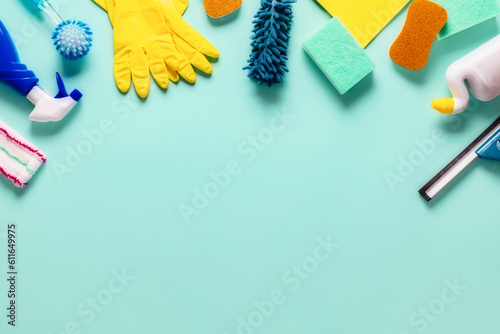 Top view composition with cleaning supplies and tools pastel background  copy space