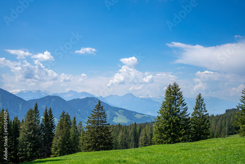Scenic view in the mountains with blue sky and clouds