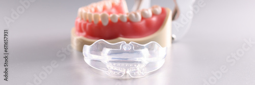 Silicone orthodontic retainers to hold teeth and artificial jaw. Orthodontics dental care for teeth alignment