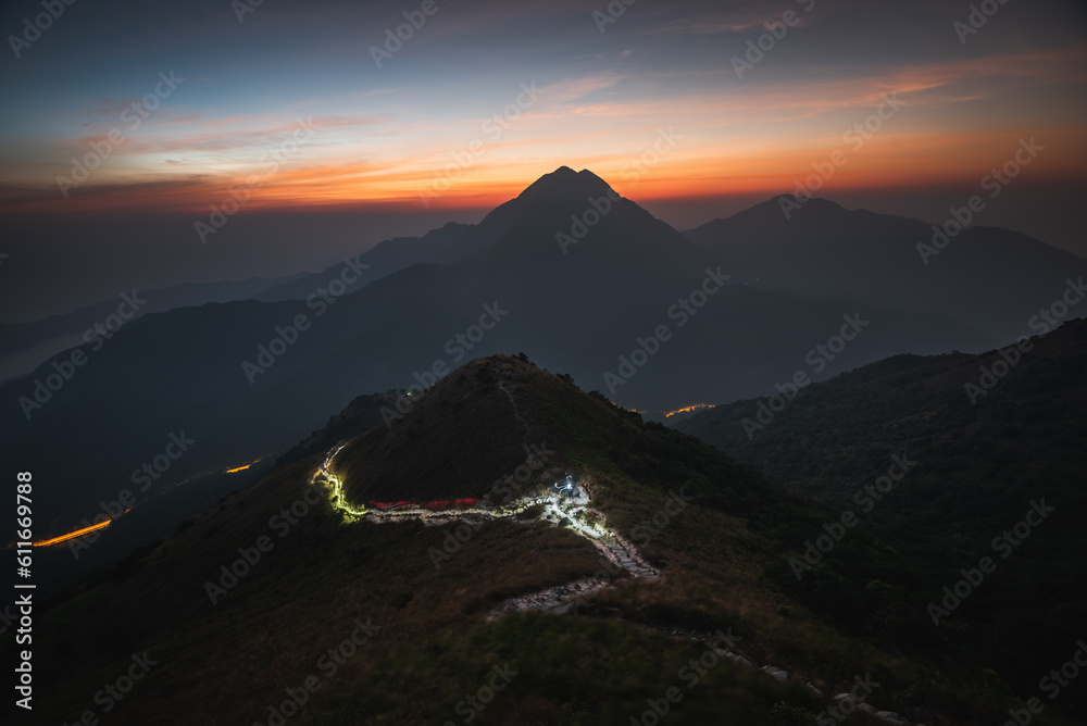 Sunset peak in Hong Kong during sunset with Lantau peak at background