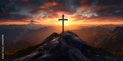 cross at sunset on mountains