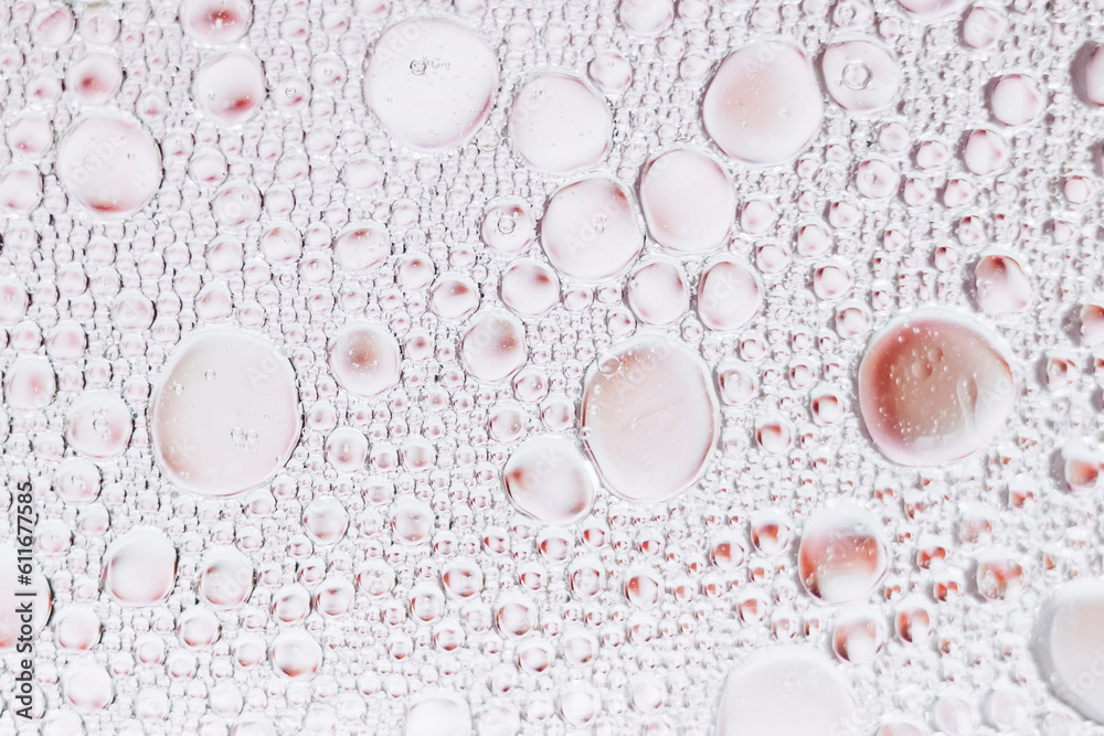 Arrière plan abstrait bulles - Huile dans de l'eau sur un fond flou multicolore