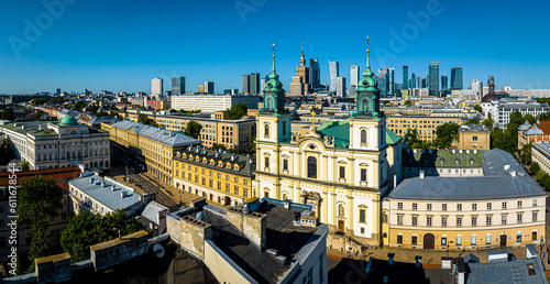 Aerial view of Holy Cross Church in Warsaw with city skyline on the background, Poland