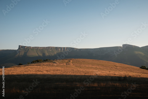 Landscape at sunset of the mountain range d Gorobel or Sierra Salbada with the Pico Tologorri and Ungino in the valley of ayala or aiaraldea in summer photo