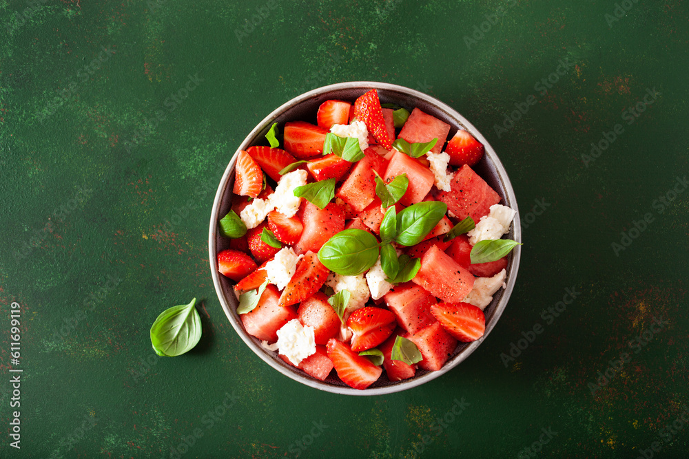 watermelon salad with strawberry mozzarella cheese basil. healthy summer dessert